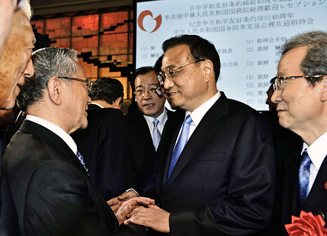 Pres. Harada and Chinese Premier Li Keqiang