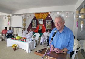 Dr. Hunter speaks at the symposium at the G. Ramachandran (G.R.) Public School in southern India